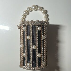 Unique pearl cylinder purse